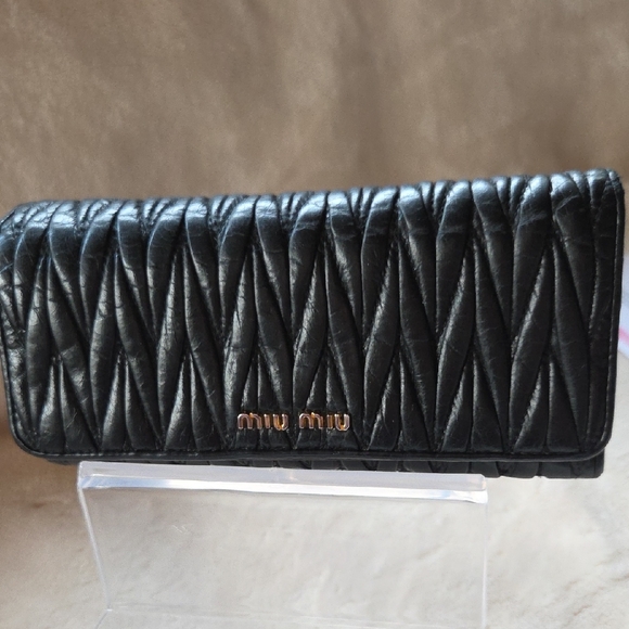 Miu Miu Handbags - Miu Miu Black Quilted Leather Wallet